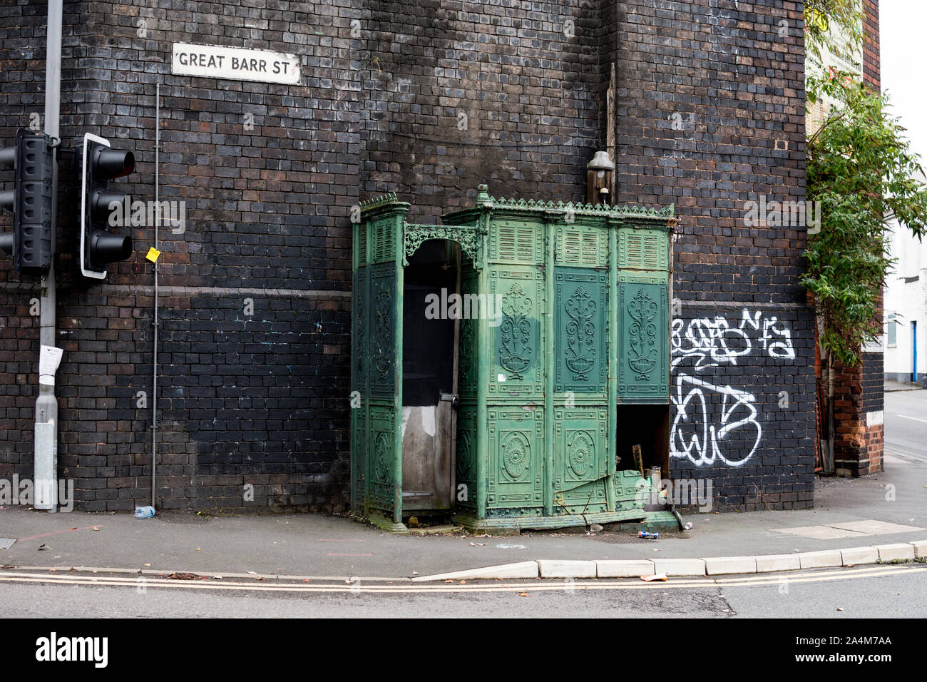 Derelict cast iron men`s urinal, Great Barr Street, Birmingham, West Midlands, England, UK Stock Photo